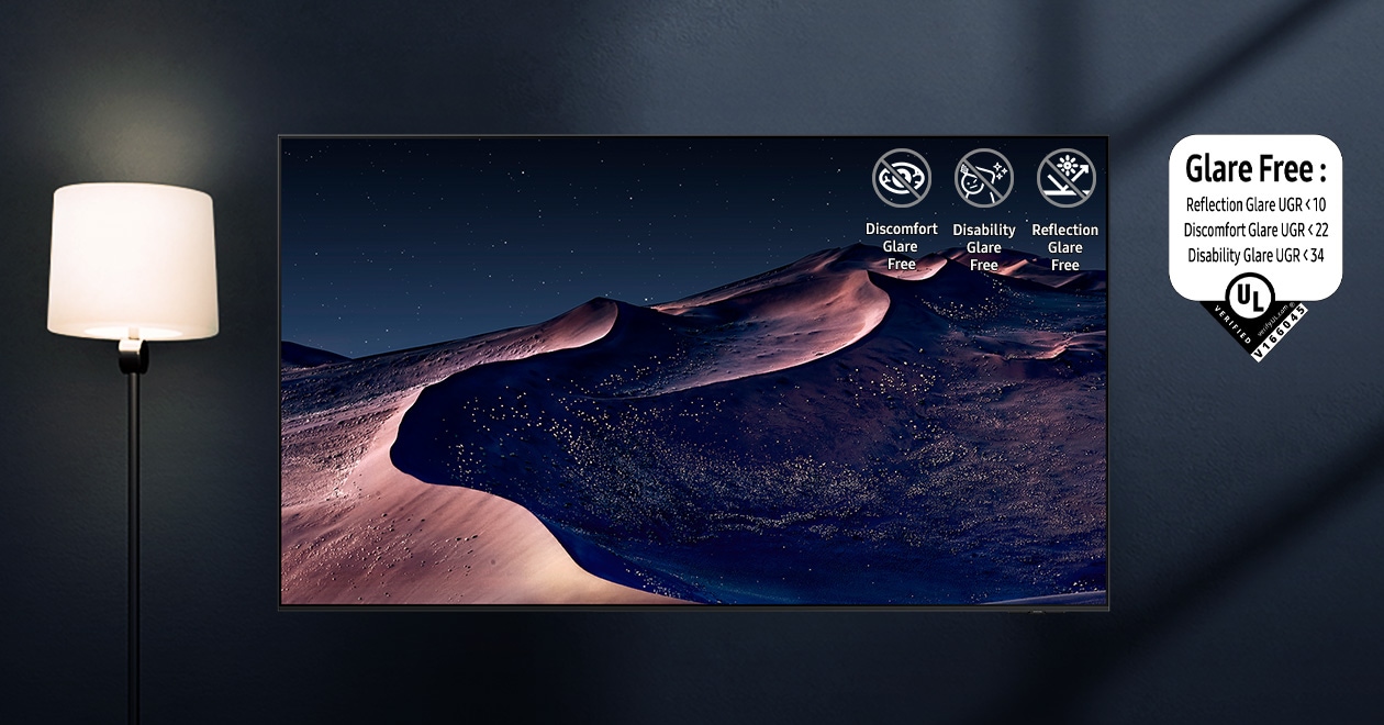 A TV displays a scene of a desert in a starry night. A nearby lamp throws distracting reflections on the screen. With glare-free technology, the screen becomes clear. UL Verified Logo. Glare Free: Reflection Glare UGR < 10, Discomfort Glare < UGR 22, Disability Glare < 34. verifyUL.com®. V166045.